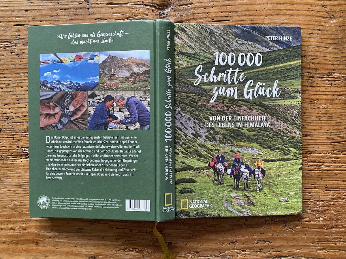 Rezension - National Geographic / Peter Hinze: 100.000 Schritte zum Glück - von der Einfachheit des Lebens im Himalaya